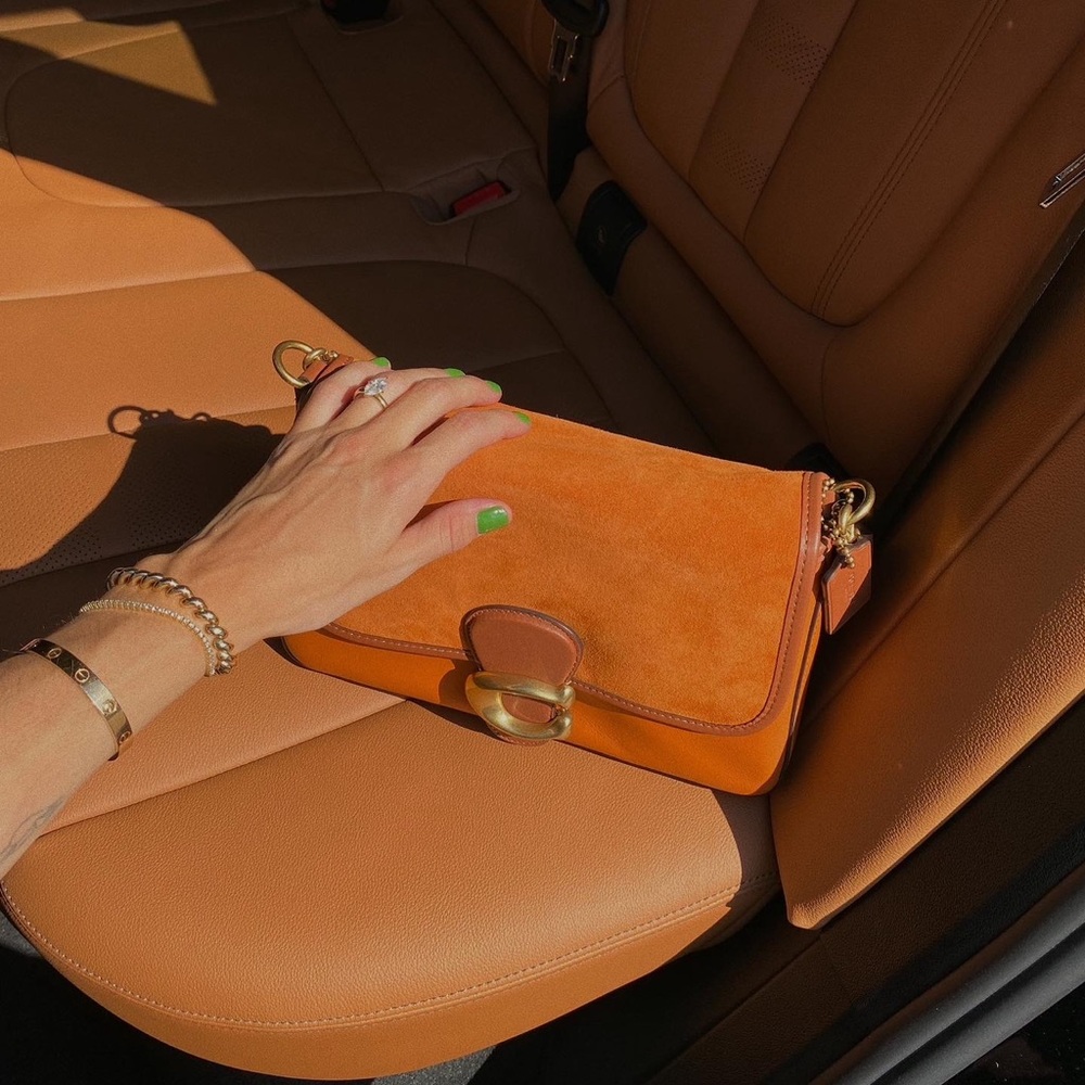 Suede coach shoulder bag